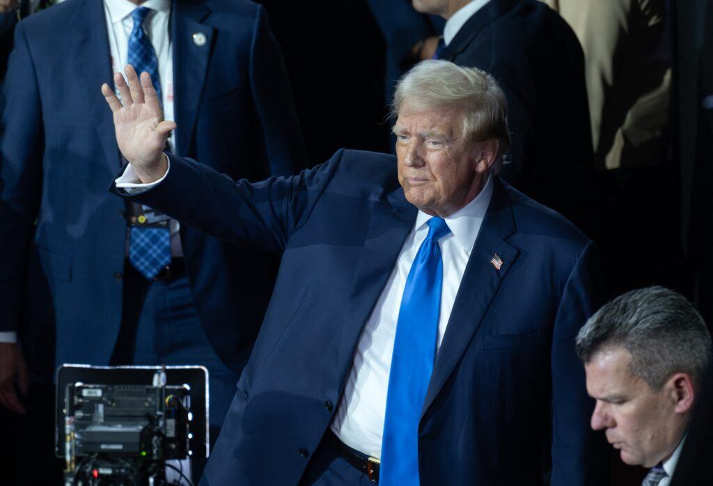 Former United States President Donald J Trump arrives during Day 2 of the 2024 Republican National Convention at the Fiserv Forum in Milwaukee, Wisconsin.